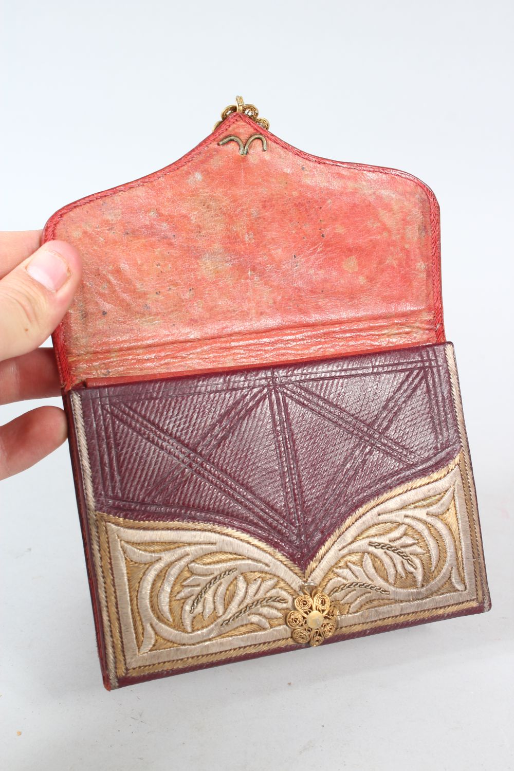 TWO OTTOMAN SILVER THREAD DECORATED LEATHER WALLETS, one dated 1908, 14cm and 10cm wide, (2). - Image 5 of 6