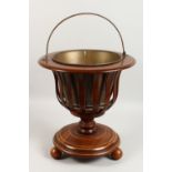A DUTCH MAHOGANY JARDINIERE, with brass liner. 16ins high.