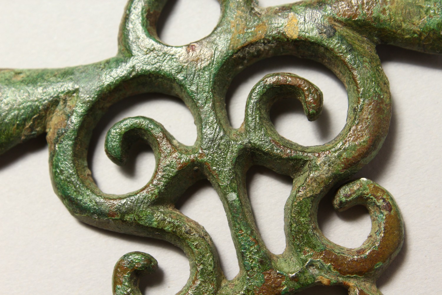 A ROMAN PIERCED BRONZE AMULET/BUCKLE. 3ins wide. - Image 2 of 4