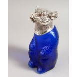 A NOVELTY SILVER PLATE AND BLUE GLASS CLARET JUG, in the form of a bear. 9ins high.