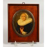 AN OVAL PORTRAIT MINIATURE, lady wearing a black coat with large white ruff, oil on copper, in an
