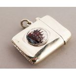 A PLAIN SILVER AND ENAMEL VESTA CASE.