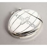 A RUGBY BALL SHAPED VESTA CASE.