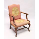 A GEORGE III STYLE MAHOGANY FRAMED SMALL ARMCHAIR, with needlework upholstery, on cabriole legs.