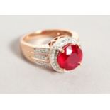 A 14K ROSE GOLD AND DIAMOND RING, set with an oval cut ruby approx. 4ct, diamonds approx. 0.48ct