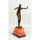 AN ART DECO STYLE BRONZE OF DANCERS, on a stepped marble base. 19ins high.