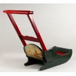 A CHILD'S PAINTED WOOD SLEIGH, EARLY 20TH CENTURY. 30ins long.