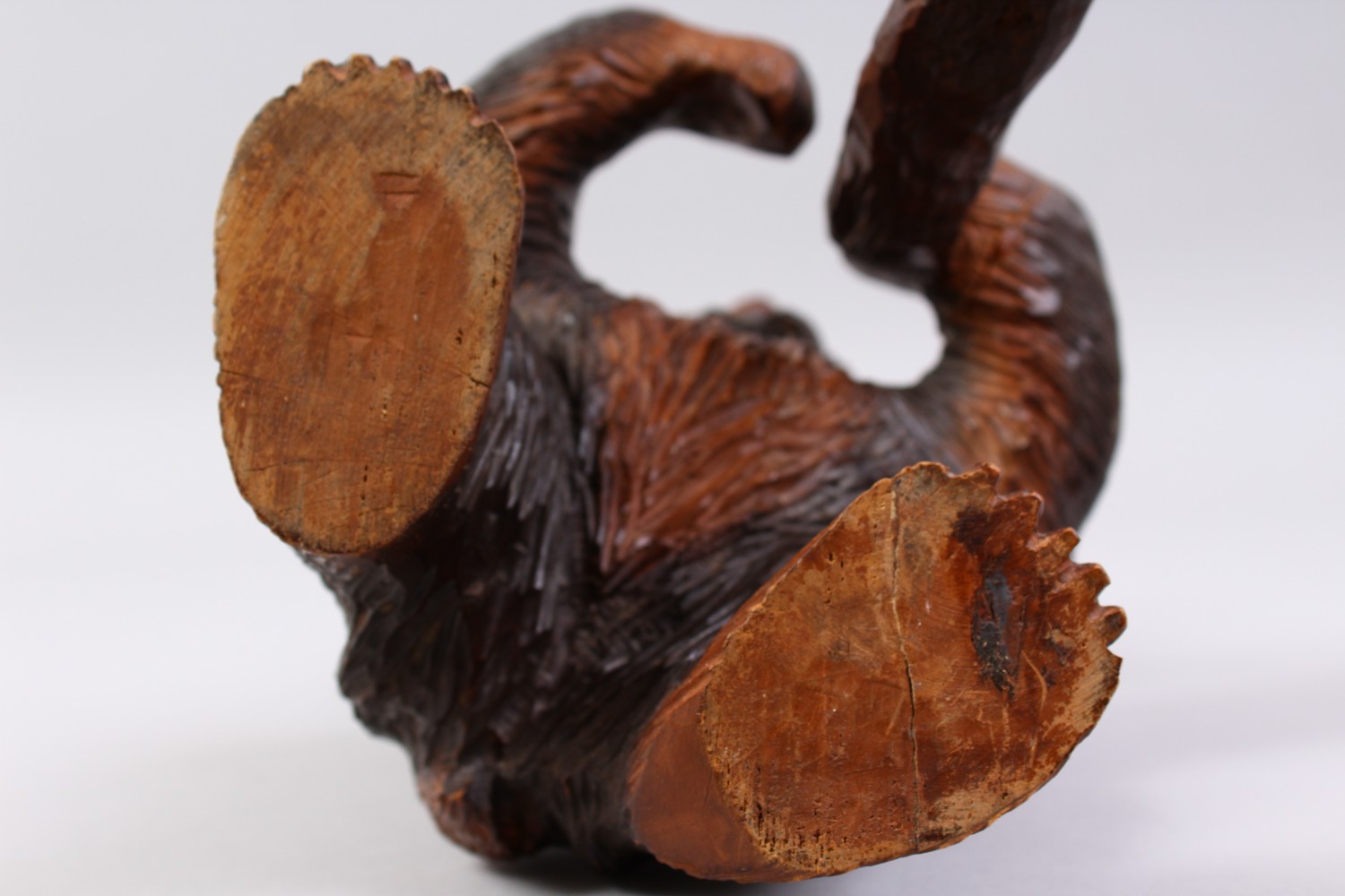 A GOOD 19TH CENTURY BLACK FOREST CARVED WOOD STANDING BEAR CADDY, with hinged head. 11ins high. - Image 10 of 12