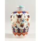 AN 18TH/19TH CENTURY TIN GLAZE IMARI STYLE JAR AND COVER, Possibly by Adrian Kouts, painted with
