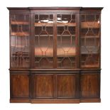 A GOOD GEORGE III DESIGN MAHOGANY BREAKFRONT LIBRARY BOOKCASE, with dentil and blind-fret carved
