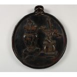 A CHINESE RELIEF CARVED HARDWOOD PLAQUE. 13ins x 11.5ins.