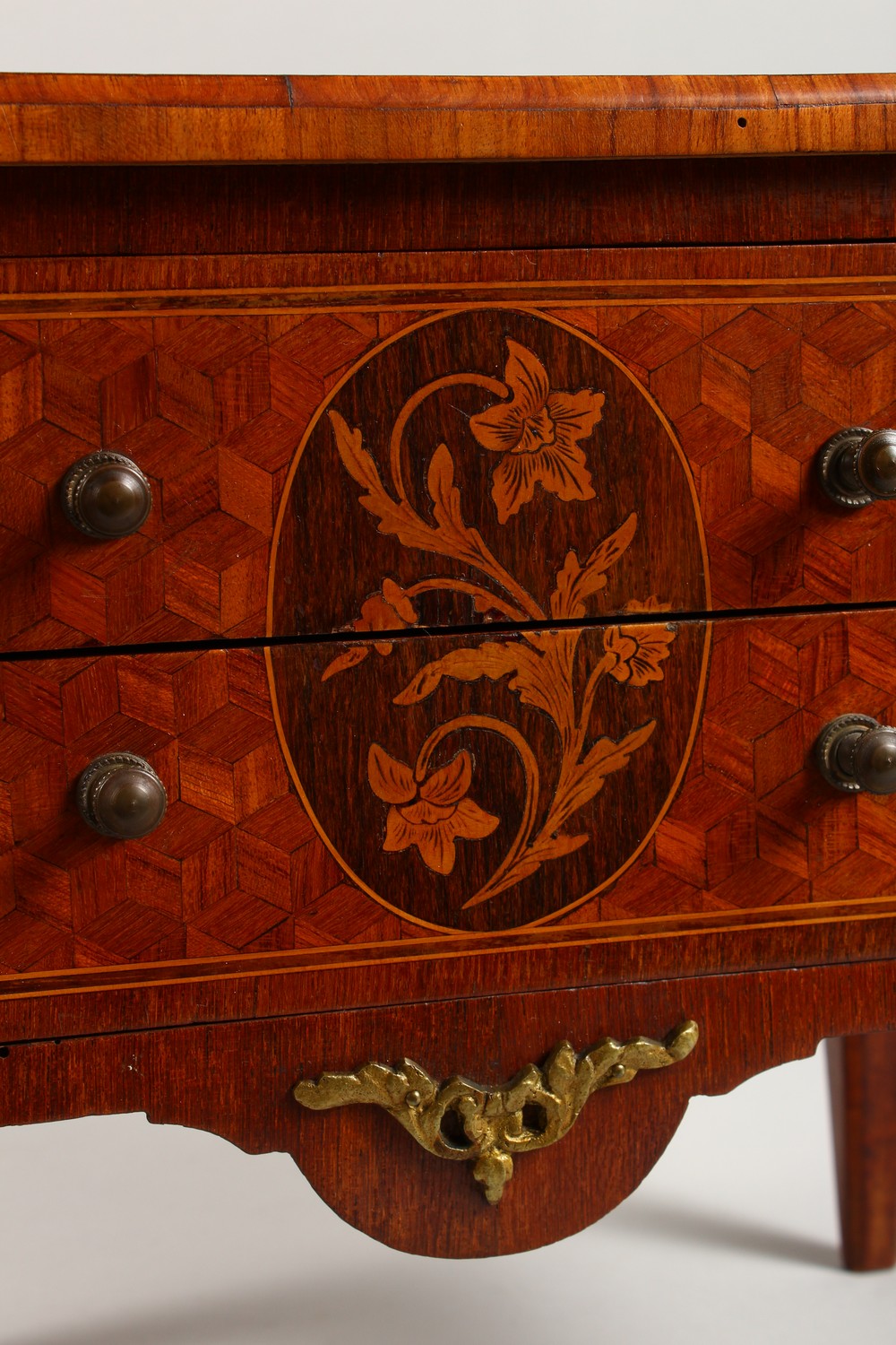 A MINIATURE FRENCH PARQUETRY AND MARQUETRY TWO DRAWER COMMODE, on tapering legs. 12ins wide. - Image 2 of 15