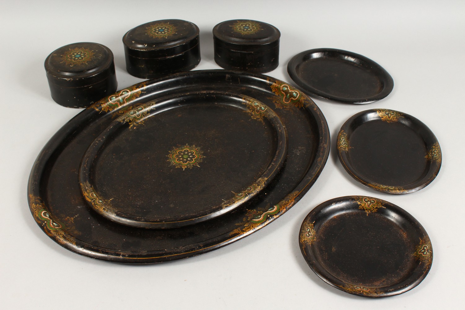 A GROUP OF LATE 19TH CENTURY TOLEWARE ITEMS, to include four trays and three boxes (7). Large