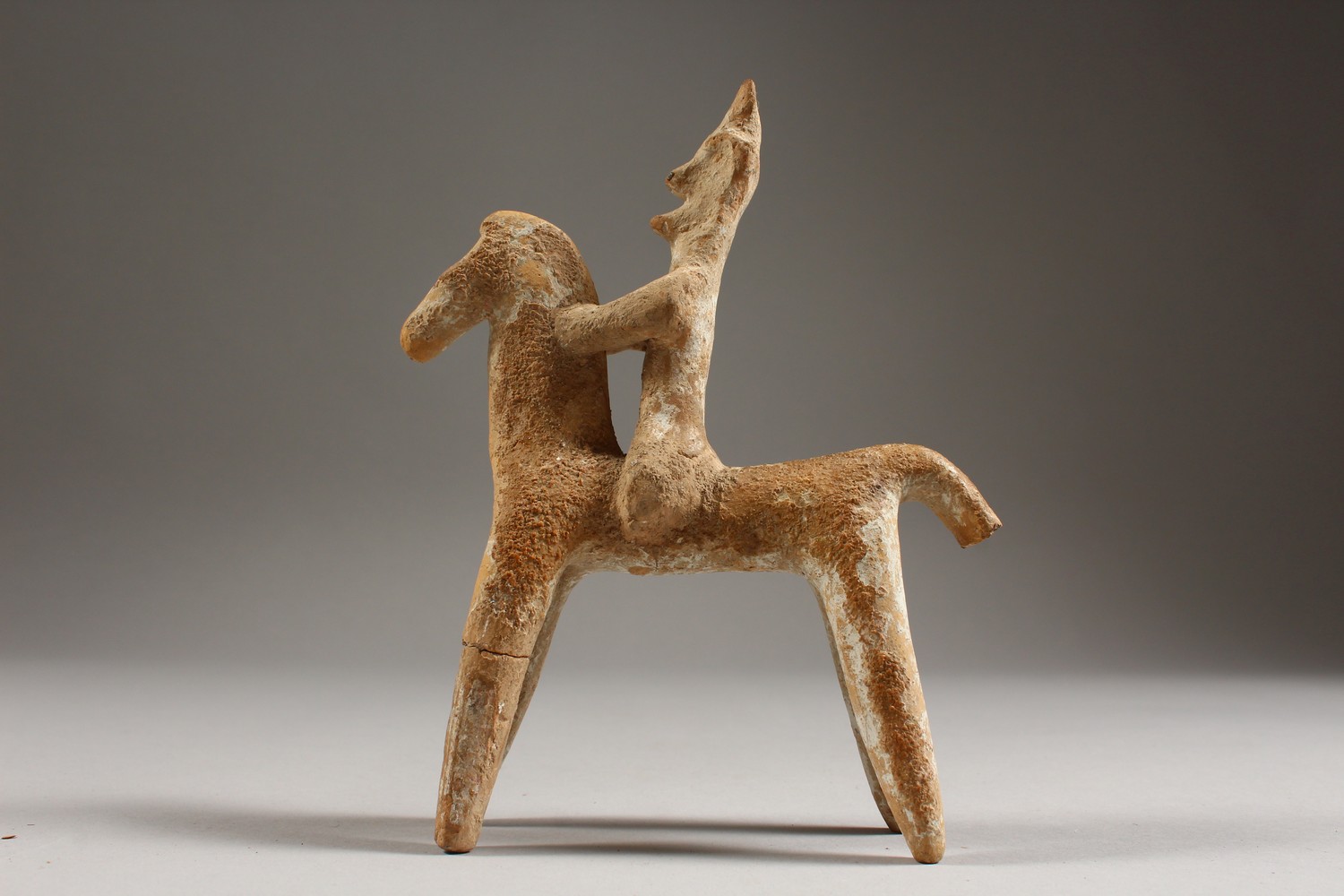 AN EARLY GREEK/CYPRIOT TERRACOTTA MODEL OF A HORSE AND RIDER. 6ins high. - Image 2 of 2