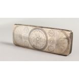 A DUTCH SILVER SPECTACLE CASE, containing an old pair of spectacles. 4.75ins long.