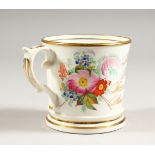 A 19TH CENTURY STAFFORDSHIRE FLORAL DECORATED MUG, with Anti Slave Motto. 3.5ins high.