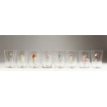 A SET OF EIGHT LARGE GLASS BEAKERS, enamelled with figures. 5ins high