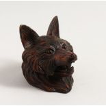 A BLACK FOREST CARVED WOOD FOX INKWELL.