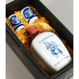 GEKKEIKAN SAKE, in a porcelain bottle with two cups, boxed.