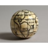 A COMBINATION BONE GLOBE/COMPASS. 1.75ins diameter.