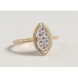 AN 18CT WHITE GOLD DIAMOND SET MARQUISE SHAPED RING of 60 points.