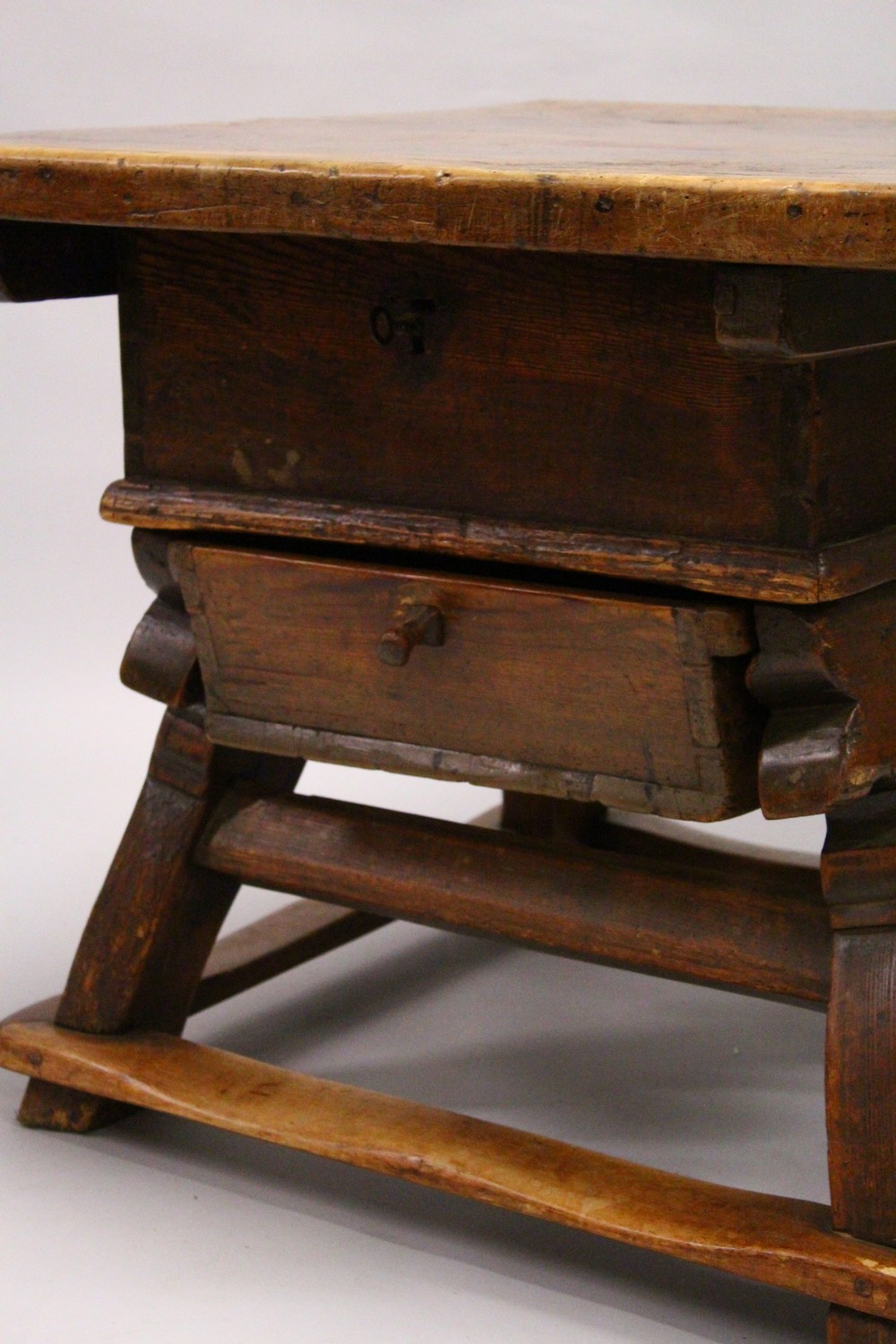 AN UNUSUAL EARLY 18TH CENTURY CONTINENTAL FRUITWOOD AND PINE RENT TABLE, with a sliding thick - Image 2 of 7