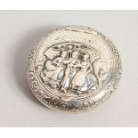 A SMALL CONTINENTAL CIRCULAR SILVER SNUFF BOX, with embossed decoration. 2ins diameter.