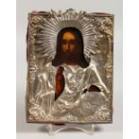 A RUSSIAN SILVER ICON. Christ. 8.5ins x 6.5ins.