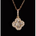 AN 18CT YELLOW GOLD DIAMOND PENDANT NECKLACE.