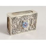 AN EDWARDIAN REPOUSSE SILVER MASONIC MATCH BOX HOLDER, with enamel Masonic emblems.