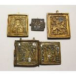 FIVE VARIOUS PIECES OF RUSSIAN BRASS ICONS.