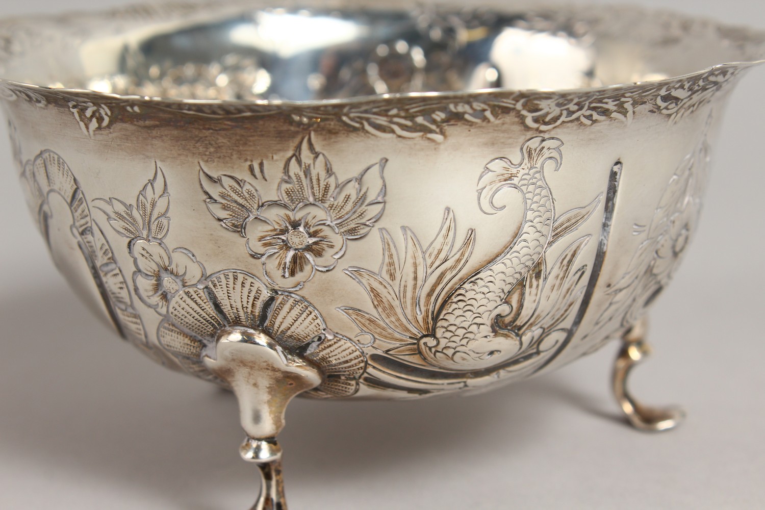 A VICTORIAN CIRCULAR SUGAR BOWL, repousse with birds, animals etc., on three pad feet. 4.75ins - Image 2 of 10