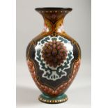 A GOOD LARGE GOUDA VASE, with stylised floral decoration. 15ins high.