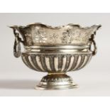 A FRENCH SILVER TWO-HANDLED PEDESTAL VASE. 5.5ins long.