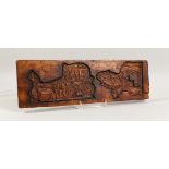 A 19TH CENTURY SINGLE SIDED WALNUT GINGERBREAD MOULD, carved with a coach and horses and a figure on