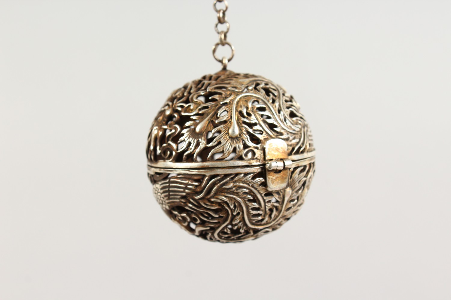 A CHINESE SILVER PIERCED BALL SHAPE CENSER. 2.5ins diameter. - Image 2 of 3