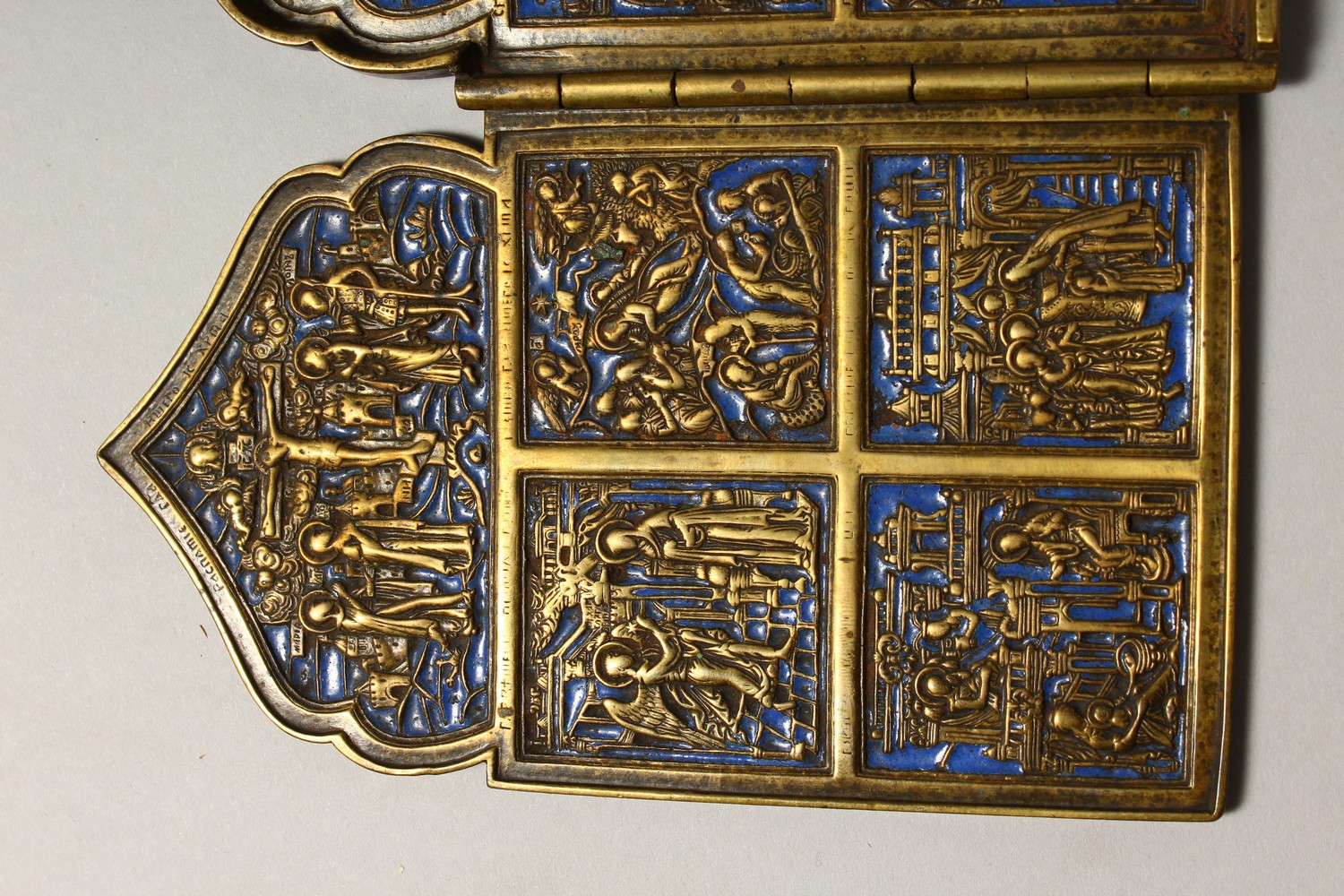 A FOUR PIECE RUSSIAN BRASS AND BLUE ENAMEL FOLDING ICON, with sixteen small panels, 1.75ins square - Image 2 of 11