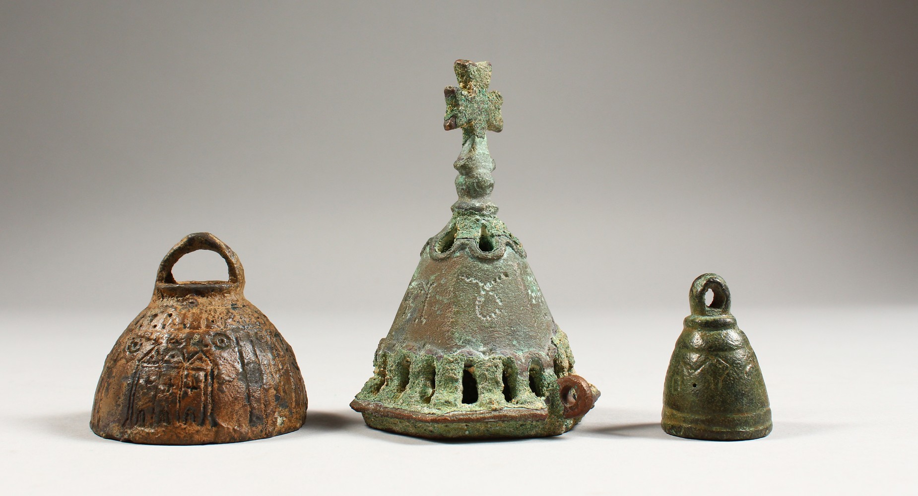 THREE BYZANTINE BRONZE BELLS. 1.5ins, 2ins and 4ins high.