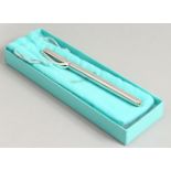 A BALLPOINT PEN, in a Tiffany box.