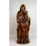 A VERY GOOD LARGE 17TH CENTURY CARVED "MADONNA AND CHILD". 39ins high.