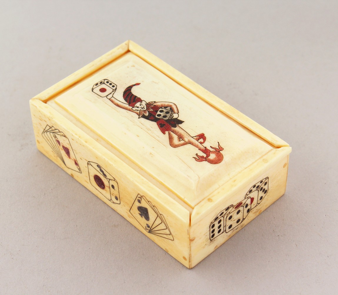 THREE PAIR OF BONE DICE in a box.