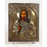 A RUSSIAN SILVER ICON. Christ. Silver Marks A.C. over 1867 84 and 40. 9ins x 7ins.