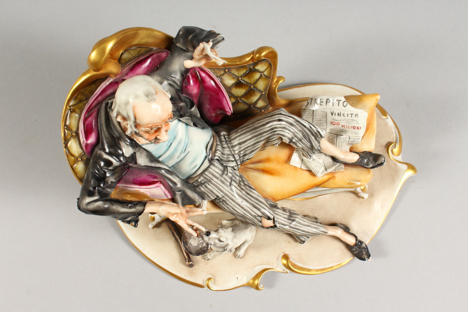 A CAPODIMONTE GROUP, a man on a chaise longue, a dog by his side. 9.5ins wide. - Image 5 of 10