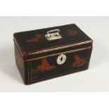 A REGENCY BLACK LACQUER TEA CADDY, with hinged lid and two divisions with Oriental design. 6.5ins.