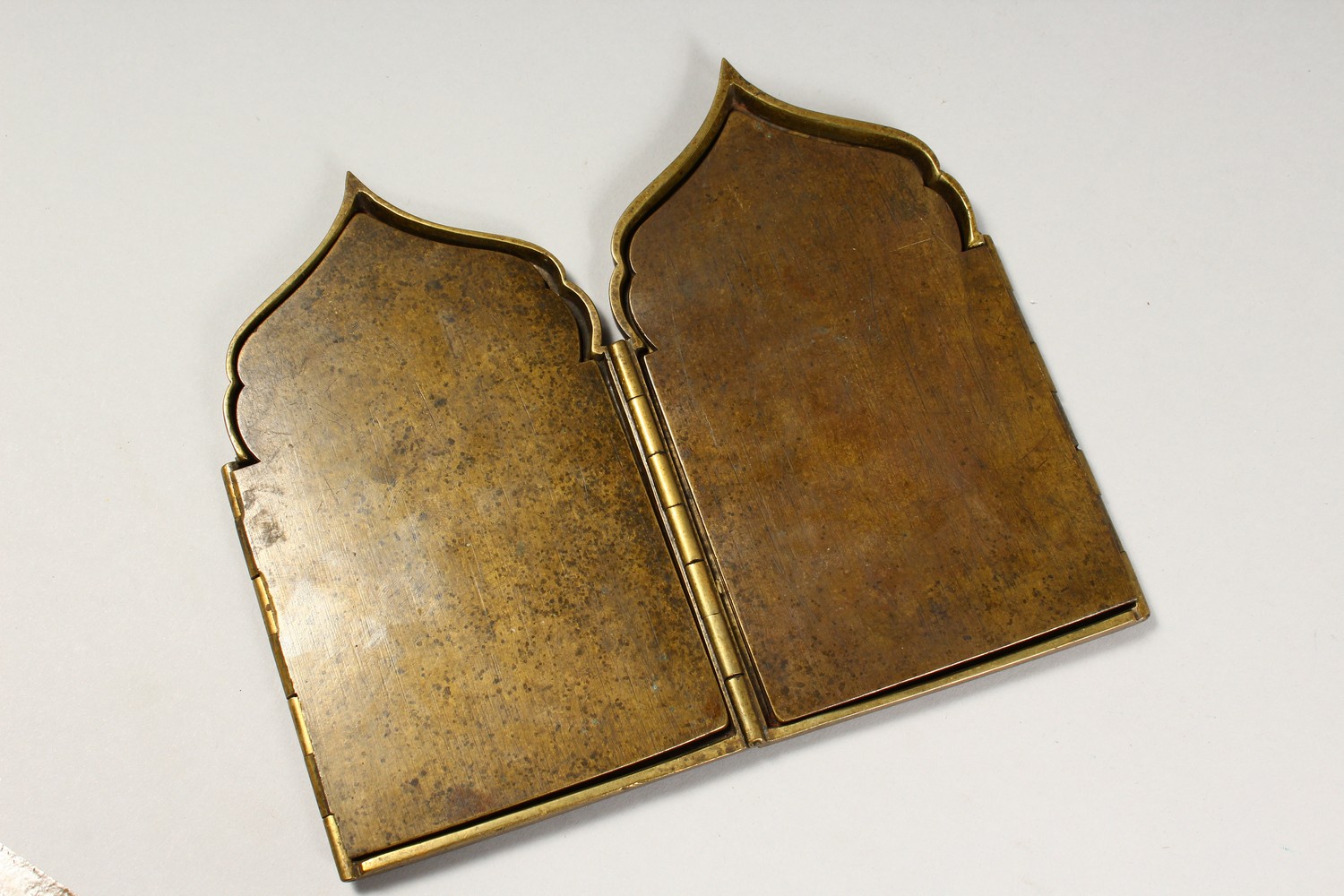 A FOUR PIECE RUSSIAN BRASS AND BLUE ENAMEL FOLDING ICON, with sixteen small panels, 1.75ins square - Image 6 of 11