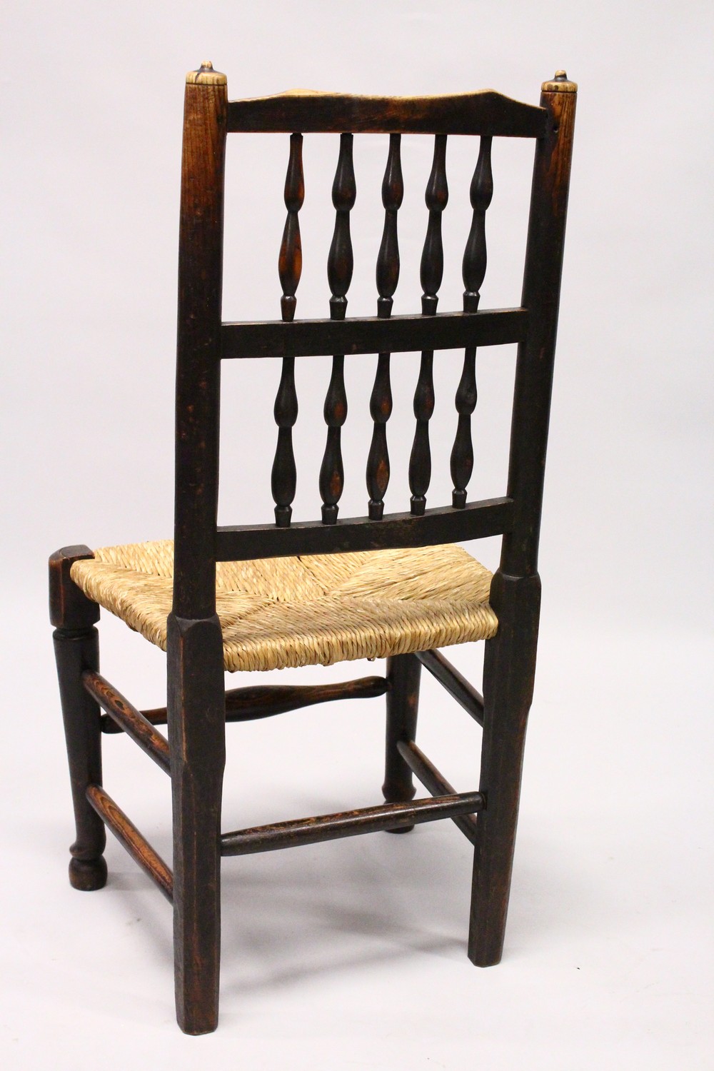A MATCHED SET OF SIX 19TH CENTURY ASH SPINDLE BACK DINING CHAIRS, with rush seats on turned and - Image 6 of 9