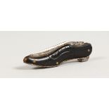 A 19TH CENTURY SHOE SHAPED FOLDING KNIFE. 2.5ins long.