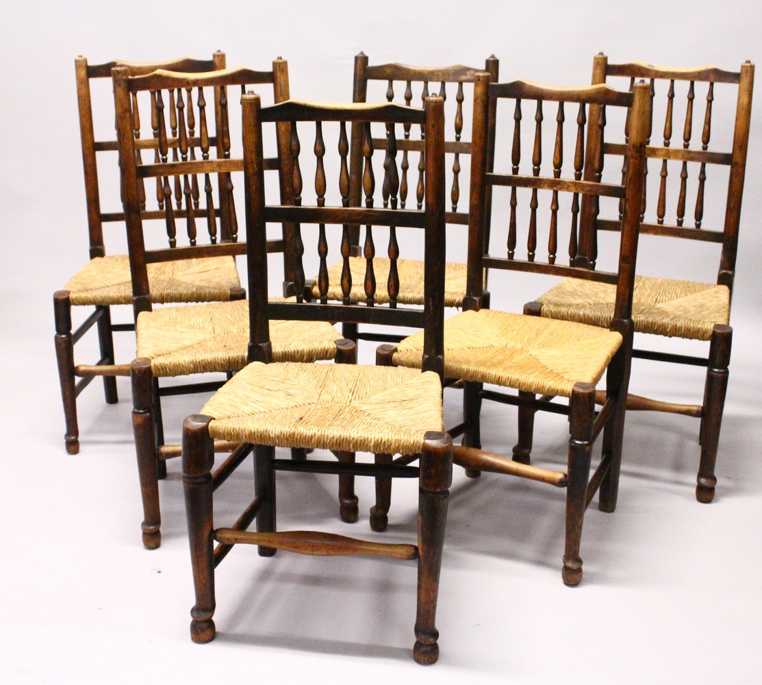 A MATCHED SET OF SIX 19TH CENTURY ASH SPINDLE BACK DINING CHAIRS, with rush seats on turned and - Image 7 of 9