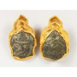A PAIR OF ROMAN SILVER GILT DROP EARRINGS with masks.