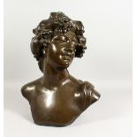 AFTER LAMBEAUX A LARGE CAST BRONZE BUST OF A YOUNG LADY. 21ins high.